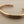 Load image into Gallery viewer, Bronze bangle on a gray background
