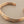 Load image into Gallery viewer, Rose gold bracelet on a dark gray background
