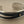 Load image into Gallery viewer, Silver and black bangle on a gray background
