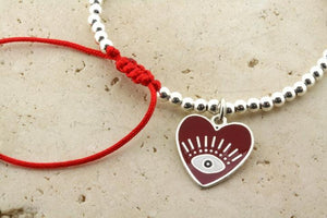 Enamelled red flying heart bead bracelet - Makers & Providers