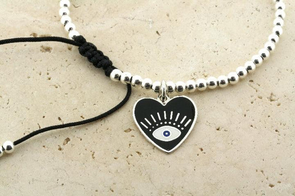 Enamelled black flying heart bead bracelet - Makers & Providers