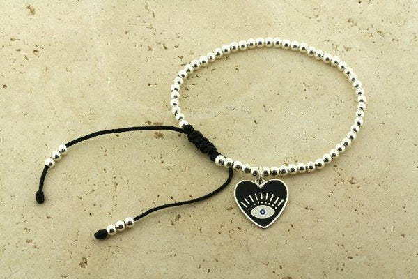 Enamelled black flying heart bead bracelet