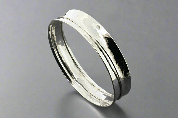 Concave hammered spinner bangle - sterling silver