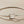 Load image into Gallery viewer, Silver bangle on a gray background
