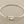 Load image into Gallery viewer, Silver bracelet with a unique clasp design on a gray background
