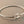 Load image into Gallery viewer, Silver bangle with a clasp on a gray background
