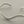 Load image into Gallery viewer, Silver bracelet on a gray background
