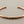 Load image into Gallery viewer, Rose gold bracelet on a dark gray background

