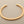 Load image into Gallery viewer, Copper bracelet on a gray background
