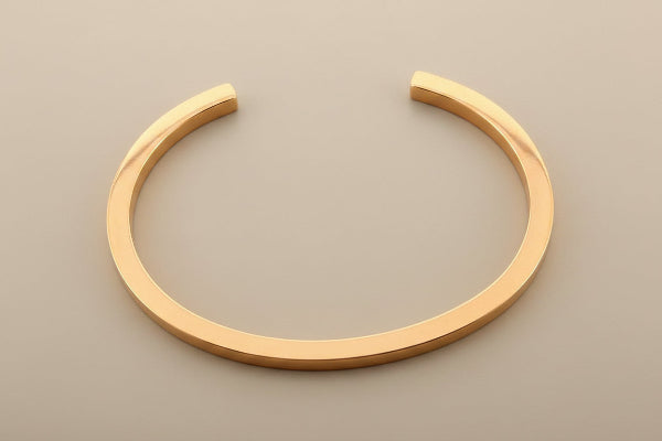 Copper bracelet on a gray background