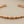 Load image into Gallery viewer, Copper bracelet on a gray background
