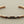Load image into Gallery viewer, Two-tone gold and silver bracelet on a gray background
