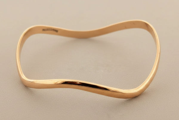 Buckled copper bangle