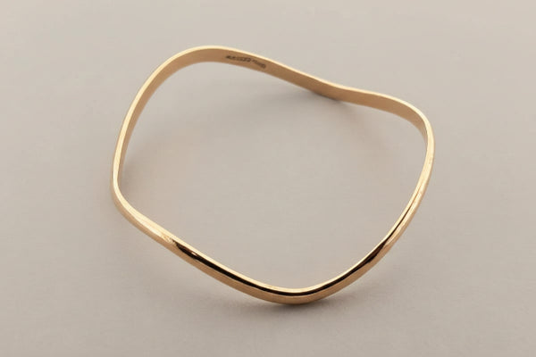 Buckled copper bangle