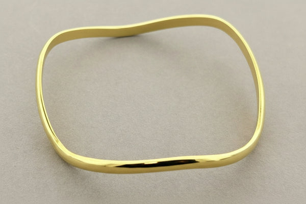 Buckled brass bangle