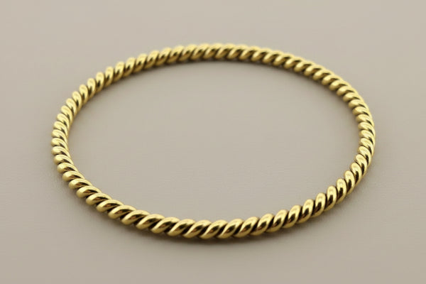 Twisted brass bangle