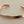 Load image into Gallery viewer, A hammered copper cuff bracelet with a textured, organic surface, displayed on a neutral gray background.
