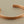 Load image into Gallery viewer, A hammered copper cuff bracelet with a textured, organic finish, displayed on a dark gray background.
