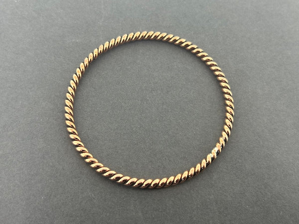 Twisted copper bangle
