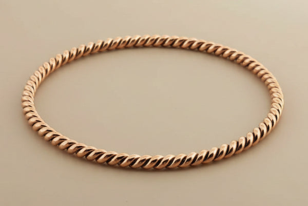 Twisted copper bangle