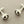 Load image into Gallery viewer, Pair of silver cufflinks on a gray background

