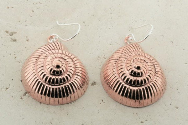 Detailed copper periwinkle shell earrings