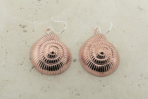 Detailed copper periwinkle shell earrings - Makers & Providers