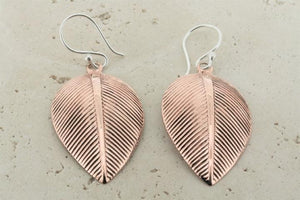 Detailed copper leaf earrings - Makers & Providers