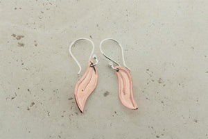 Curved copper leaf earrings - Makers & Providers