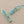 Load image into Gallery viewer, Turquoise bar earrings with gold accents on a gray background
