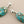 Load image into Gallery viewer, Turquoise stone earrings with silver posts on a gray background
