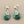Load image into Gallery viewer, Pair of turquoise earrings with silver hooks on a gray background
