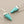 Load image into Gallery viewer, Turquoise cone-shaped earrings with silver hooks on a gray background
