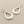 Load image into Gallery viewer, Pair of silver teardrop earrings on a gray background
