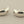 Load image into Gallery viewer, Silver hoop earrings on a gray surface
