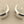 Load image into Gallery viewer, Silver crescent moon earrings on a gray background
