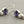 Load image into Gallery viewer, Pair of earrings with amethysts and pearls on a gray background
