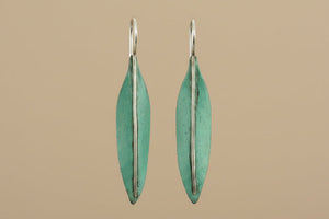 silver and copper earrings with a patina treatment