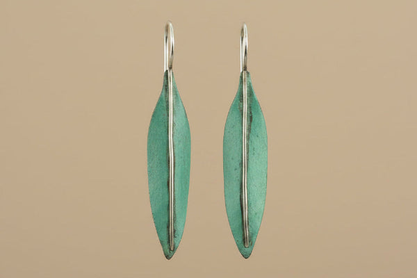 silver and copper earrings with a patina treatment