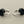 Load image into Gallery viewer, Silver hoop with black onyx disc earrings
