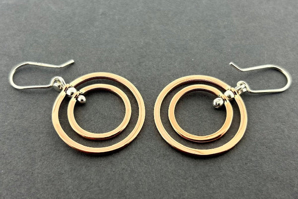 2 x copper circle  & silver swivel drop earring