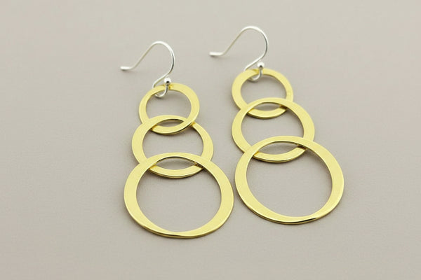 3 flattened brass hoop drop earrings