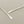 Load image into Gallery viewer, Pair of silver bar earrings on a gray background
