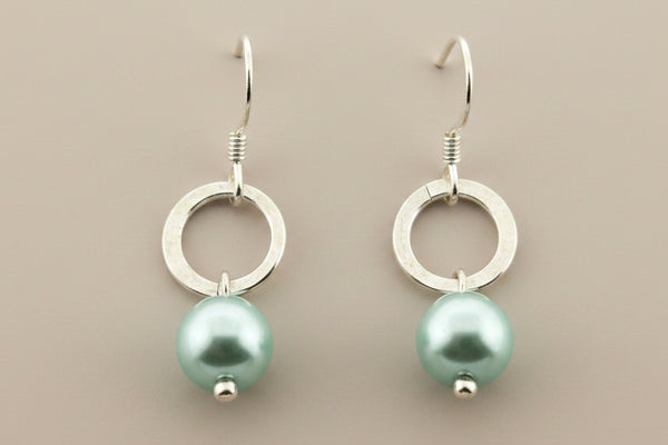 Silver circle and pearl drop earring