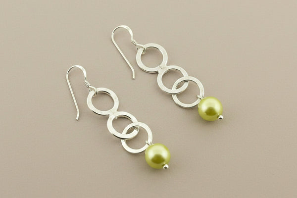 3 silver circle and pearl drop earring