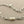 Load image into Gallery viewer, Silver chain bracelet with pearls on a gray background
