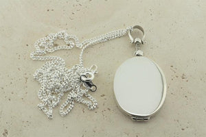 oval locket pendant on 55cm link chain - Makers & Providers