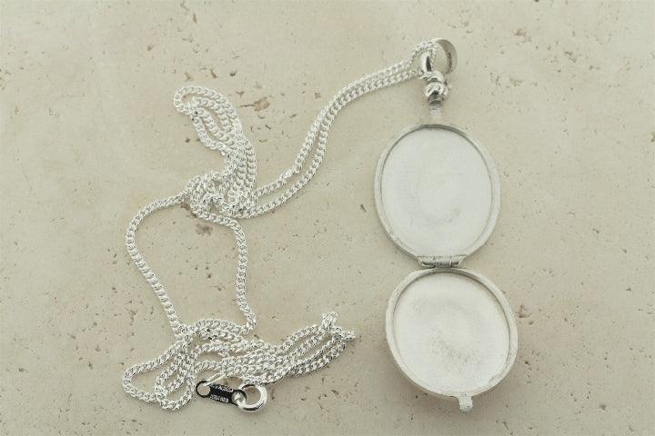 Oval locket pendant on 55cm link chain – Makers & Providers