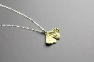 Brass ginkgo leaf pendant on silver necklace - Makers & Providers