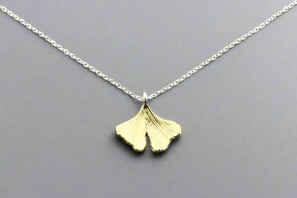 Brass ginkgo leaf pendant on silver necklace - Makers & Providers